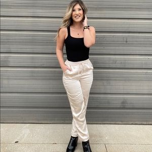 New satin pants in cream, size large